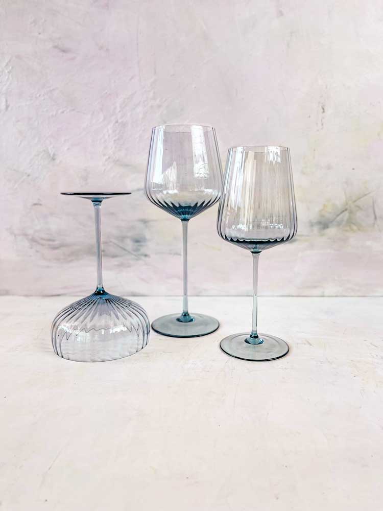 remix by Sophie champagne and wine glasses in blue smoke