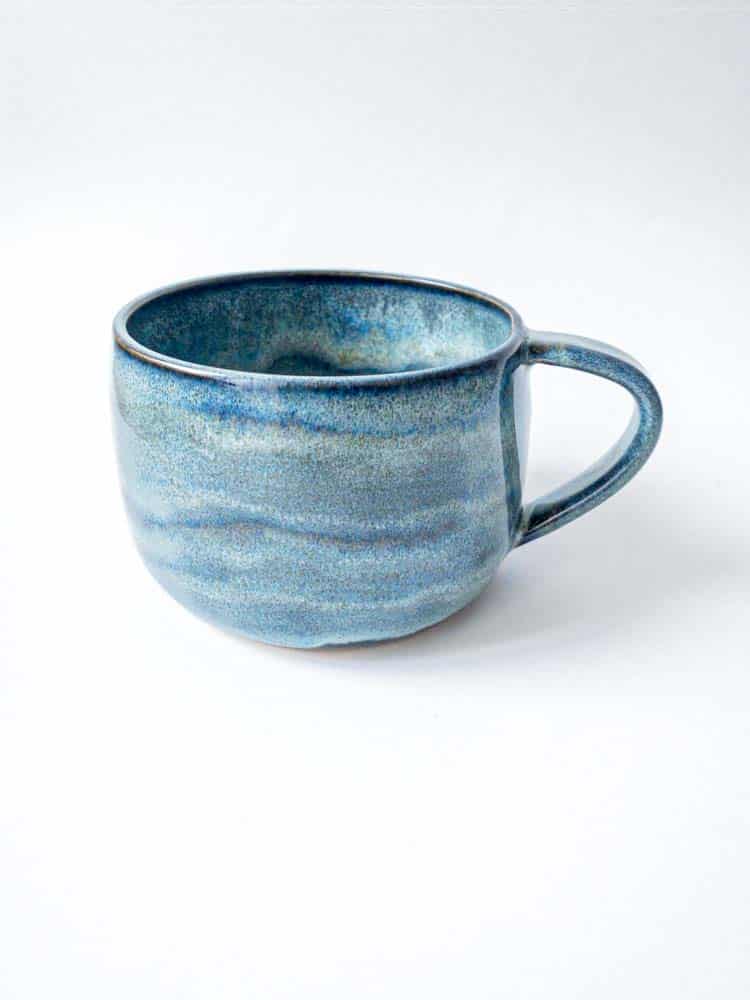 large ceramic cup with handle in blue