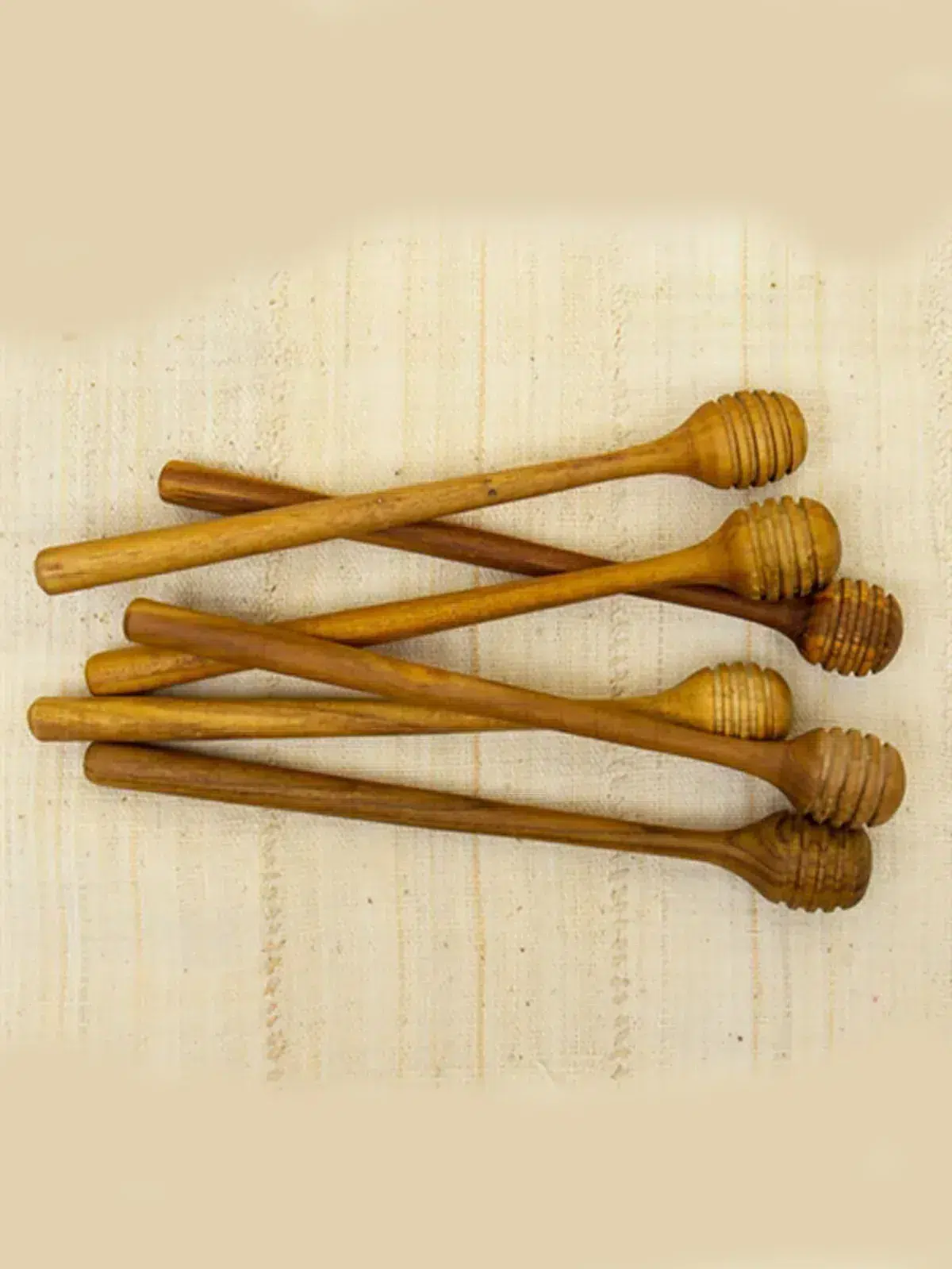 honey, cone takes, what do you bring honey, take things, fair trade teak wood.