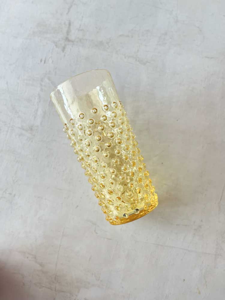 Anna von Lipa long drink glass in hedgehog glass in yellow