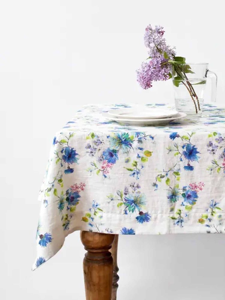 white tablecloth with blue cornflowers in linen