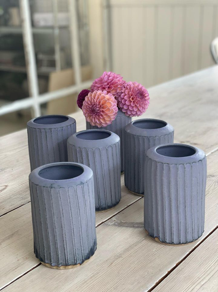 Ceramic vase with grooves in blue