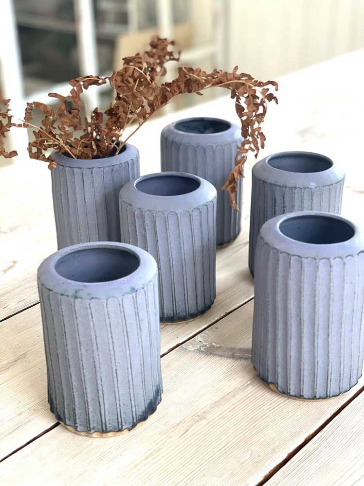 Ceramic vase with grooves in blue
