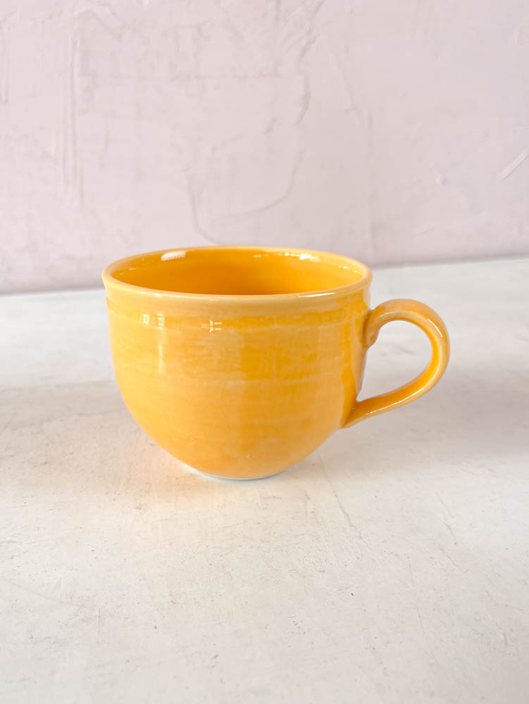 Maria Langaa ceramic cup with handle in orange