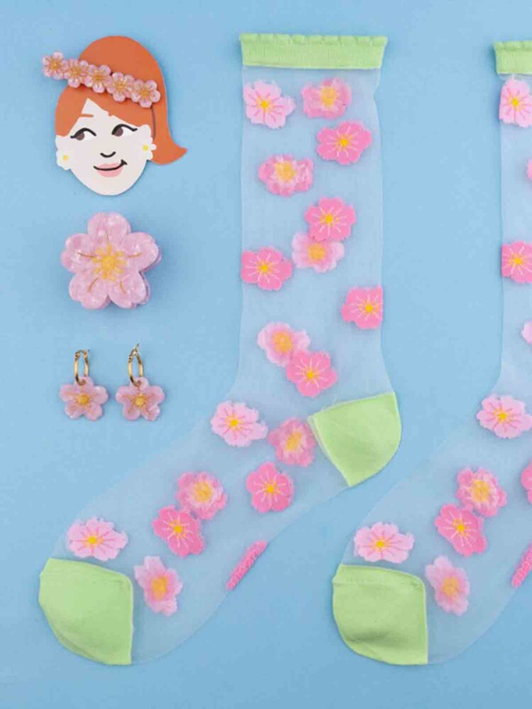 jewelry and stockings with cherry blossoms