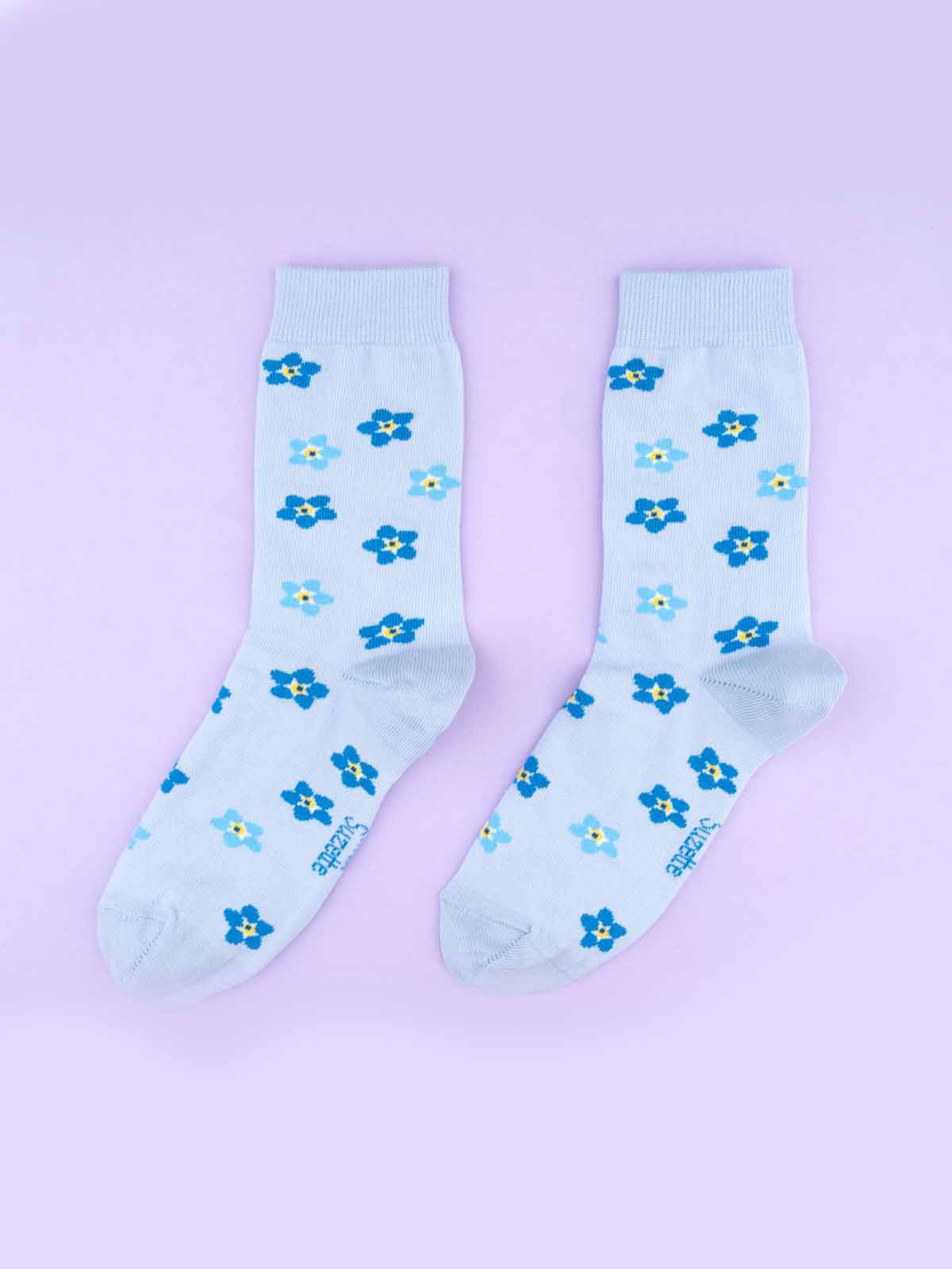 organic cotton socks in cou cou suzette in light blue with a forge with a drawstring