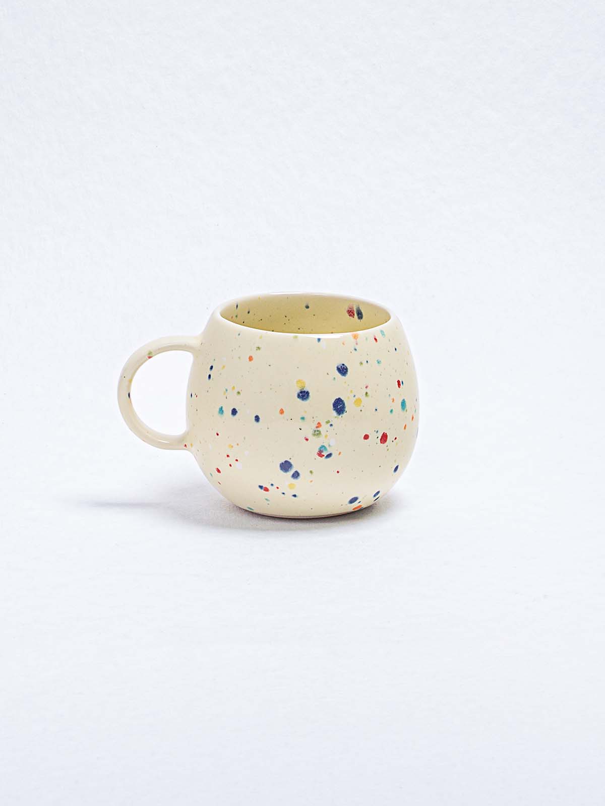 Cup in light yellow with confetti - Egg Back Home