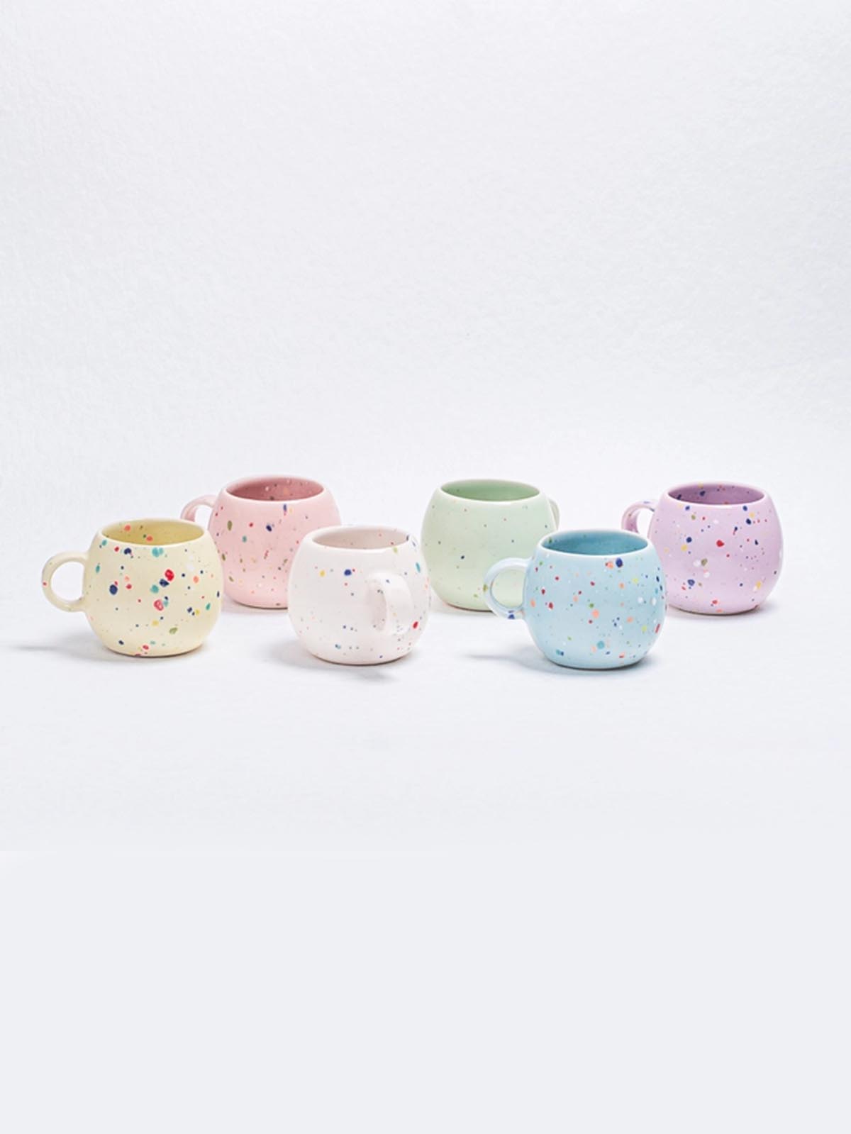 cups with handles and coloured confetti - Egg Back Home