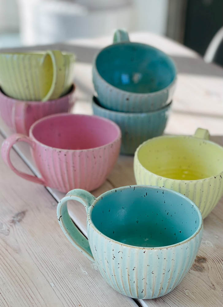 trine lise ceramic cups with grooves in pastels.ceramic cup,ceramic cup,cups,cup,handmade ceramic,handmade ceramic,thilde graulund ceramic,remix by sofie,tablecovering,housing interior,ceramic