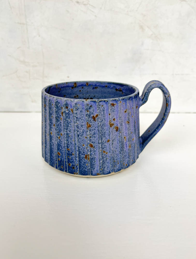 grooved ceramic cup with handle in blue