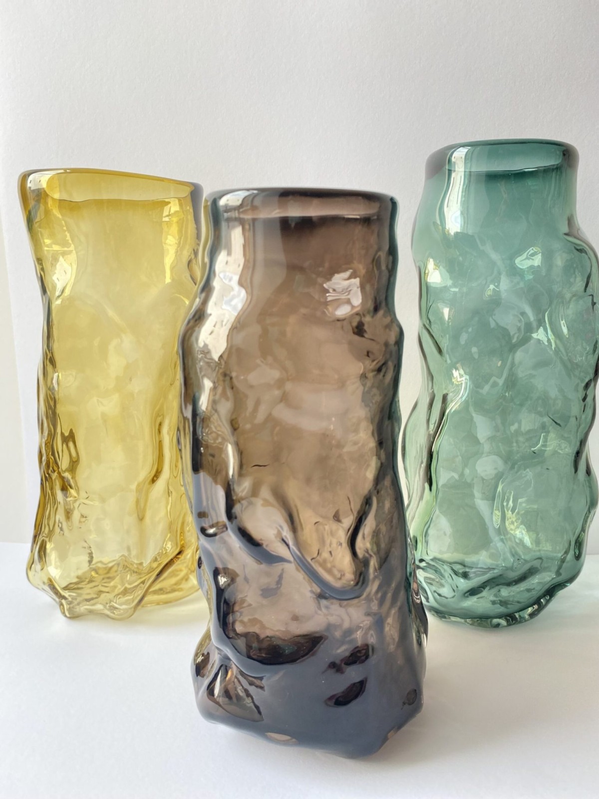 Mouth blown curl vase in transparent amber from Marie Retpen