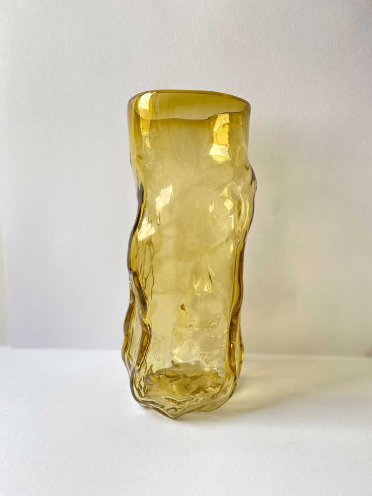 Mouth blown curl vase in transparent amber from Marie Retpen
