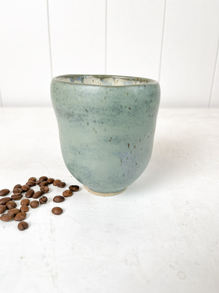 remix by sofie huge selection of handmade cups - here a ceramic cup without a handle in blue-green.