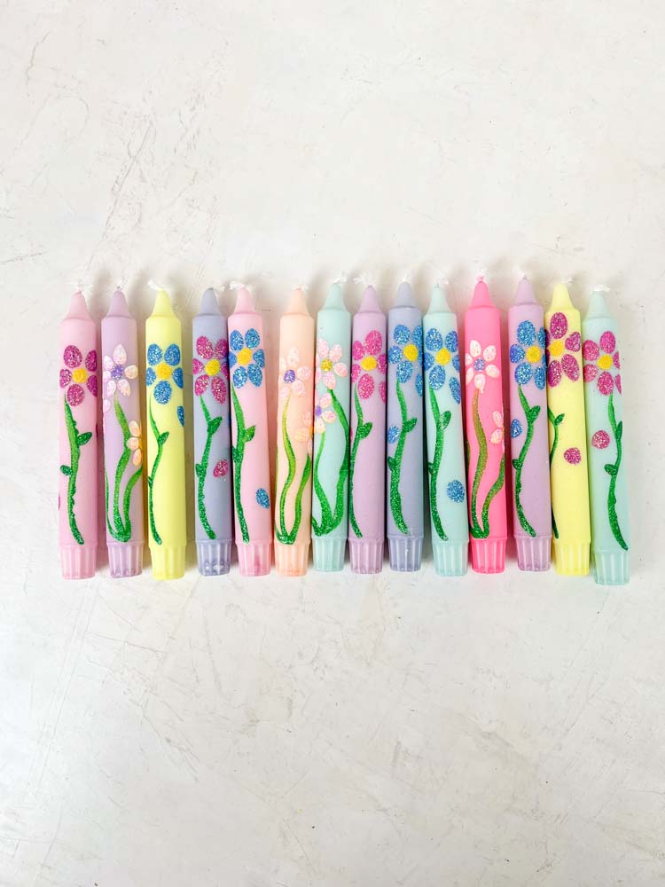 hand-painted candles in candlesticks with flowers - ahnelight