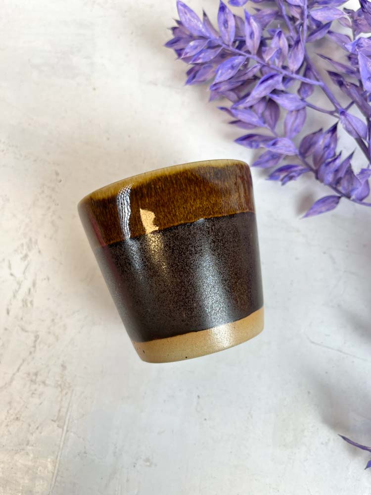 Bornholm ceramic factory original island cups - ceramic cup and mug without handle in brown.