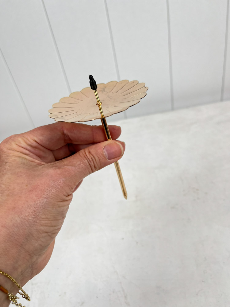 candle holders or spears for advent decorations in brass
