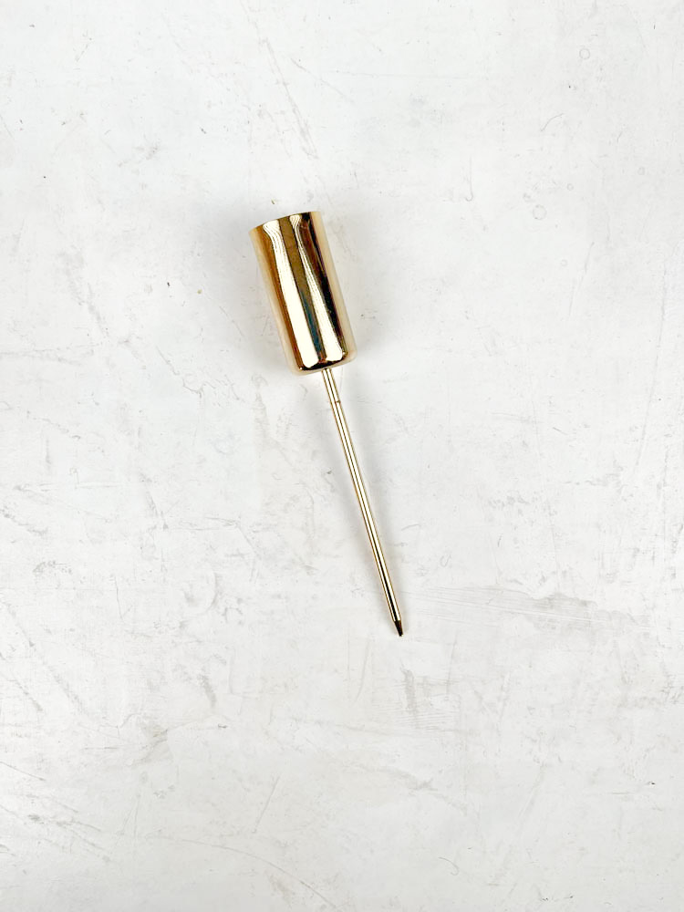 candle holders or spears for advent decorations in brass