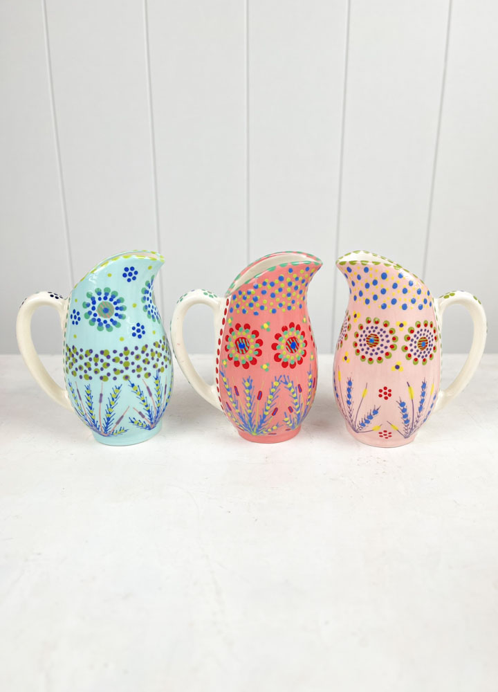 ceramic jug from the potter's work mahaba series in pastel colours with patterns