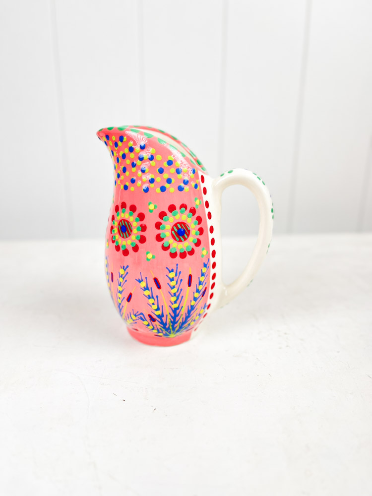ceramic jug from the potter's work mahaba series in pastel colours with patterns