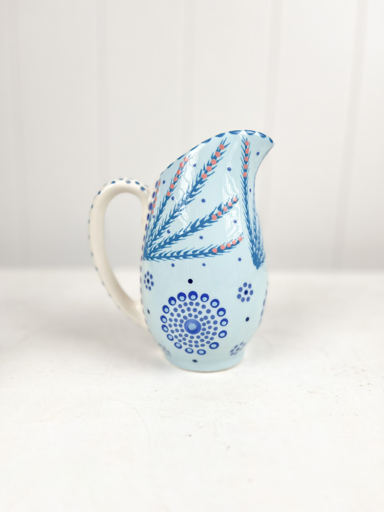 ceramic jug from the potter's work mahaba series in pastel colours with patterns