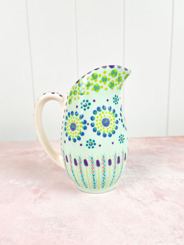 ceramic jug from the potter's work mahaba series in pastel colours with patterns