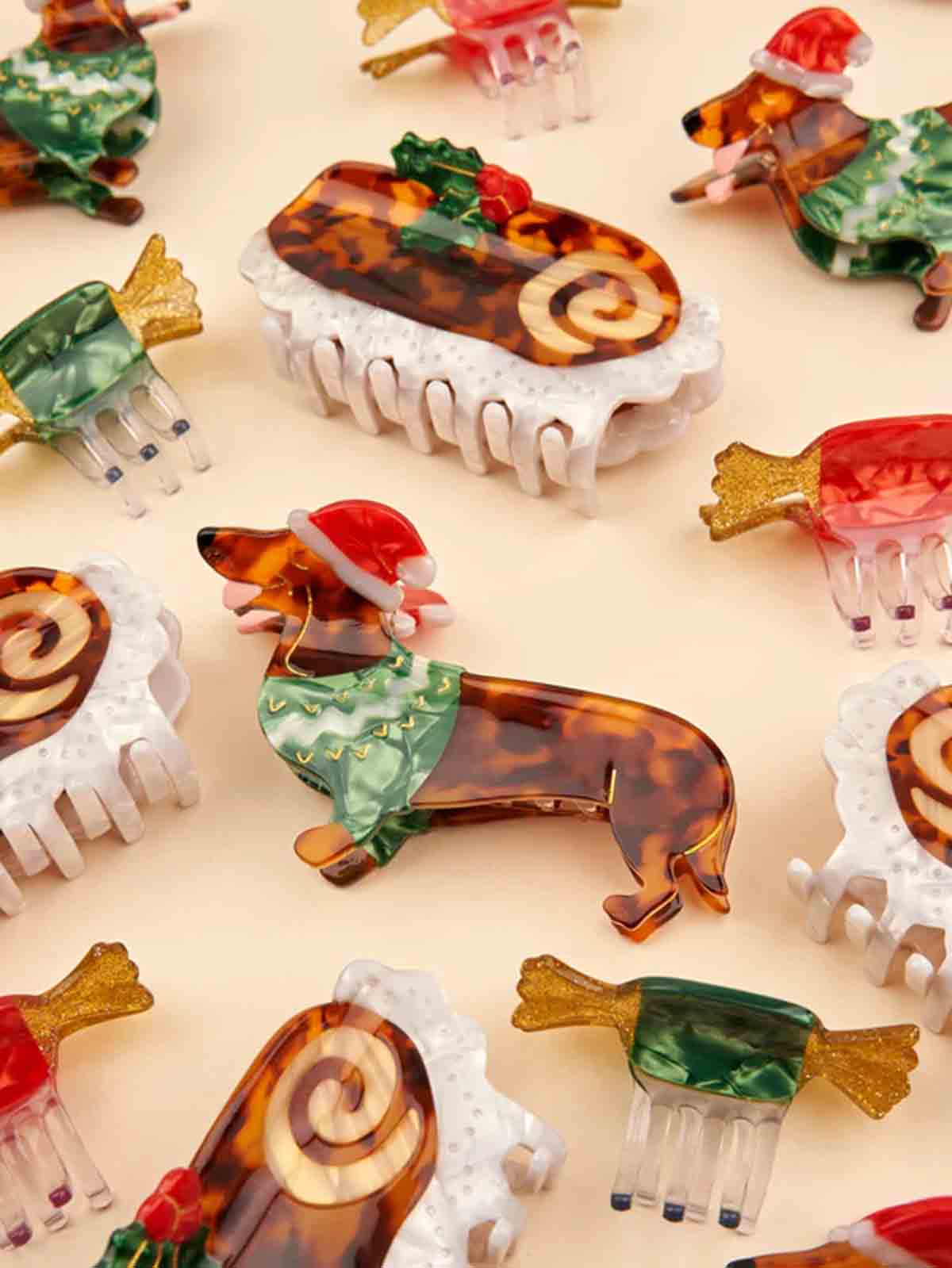 cou cou suzette hair clip with a roulade and a dachshund with an elf cap
