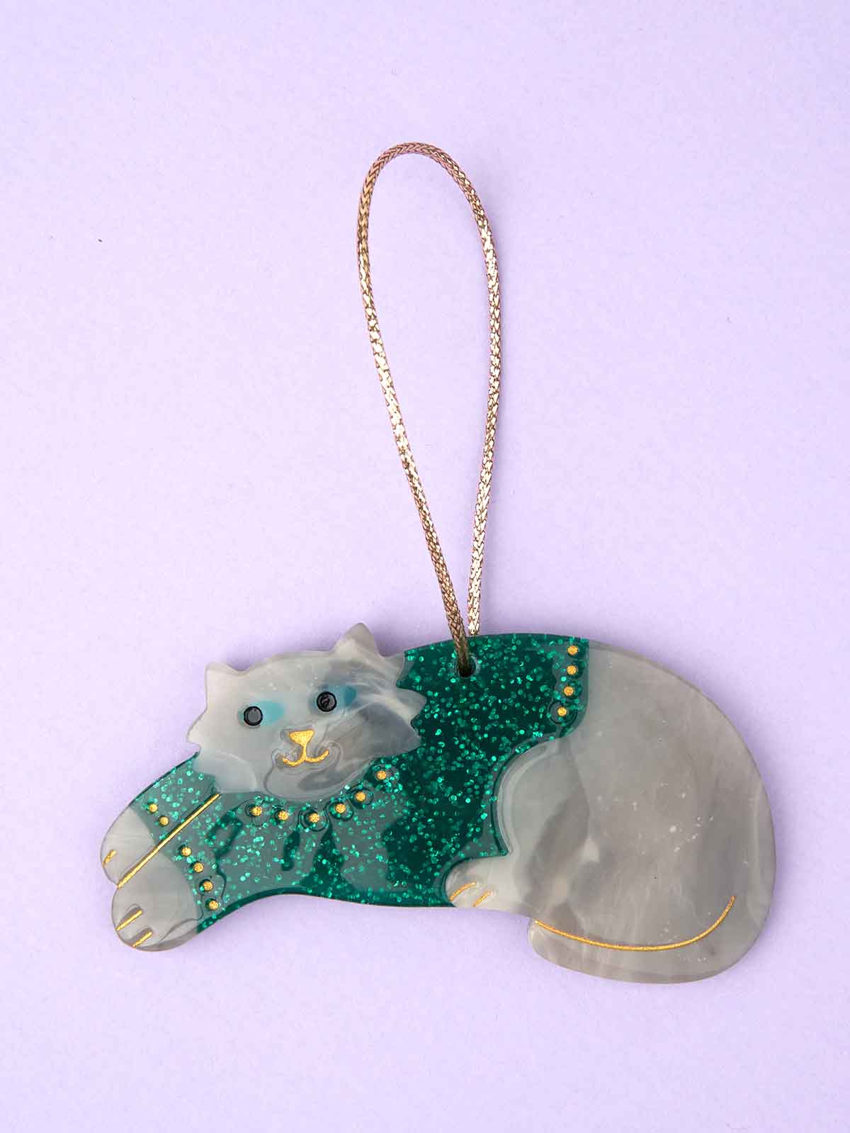 hanging grey cat from the cou cou suzette