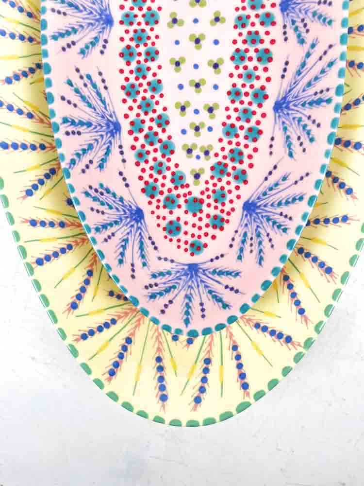 ceramic dish from the potter's work mahaba series in pastel colours with patterns