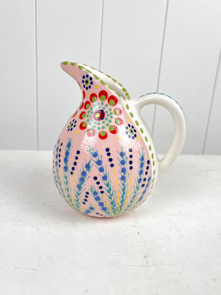 ceramic jug from the potter's work mahaba series in pastel colours with patterns
