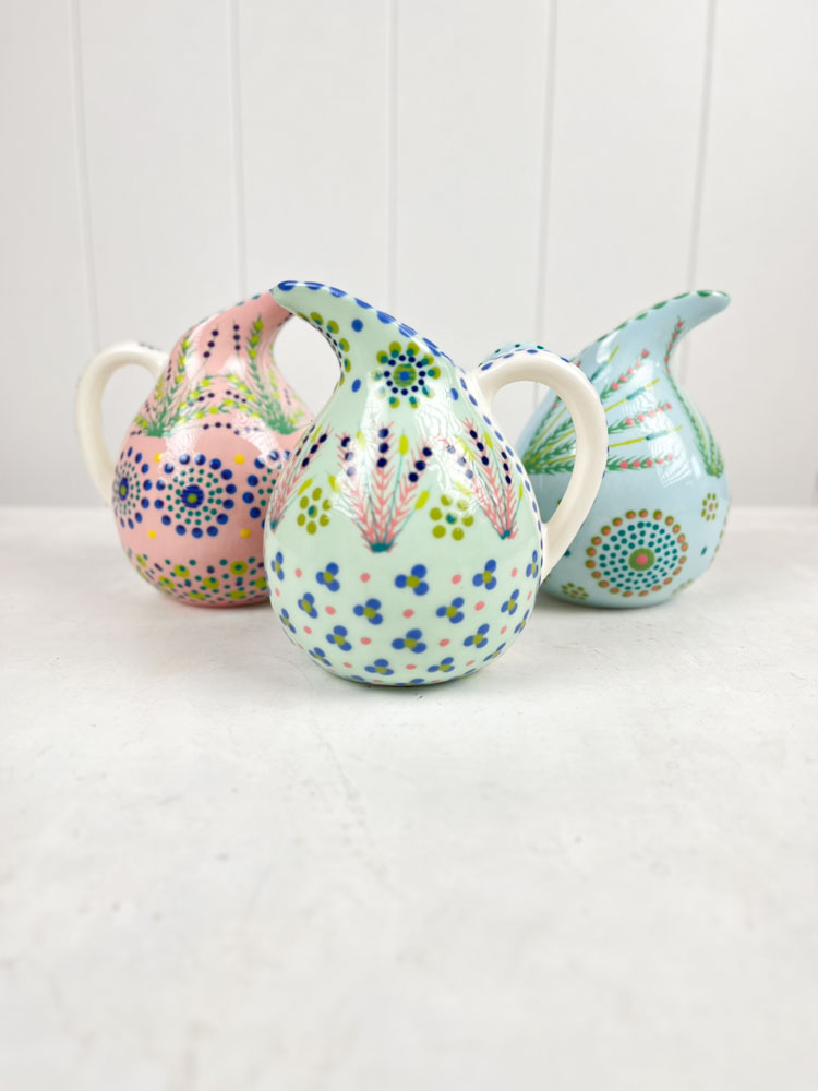 ceramic jug from the potter's work mahaba series in pastel colours with patterns