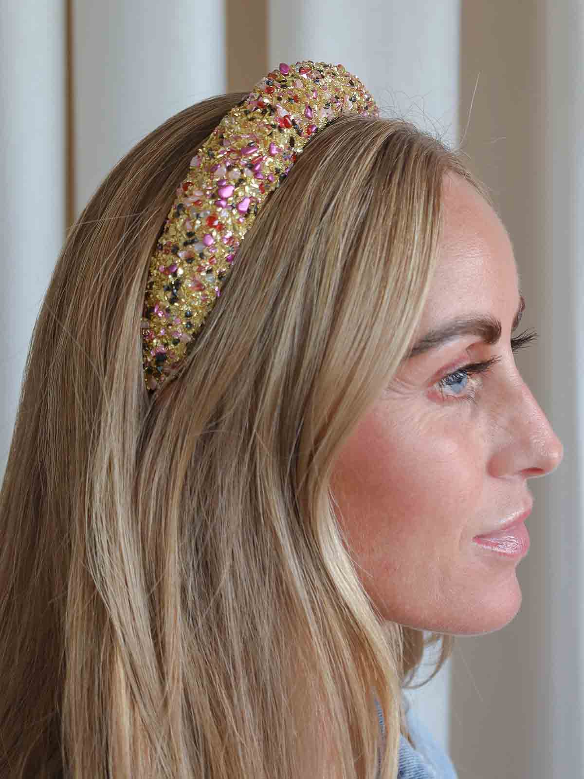 by stark hairband with gold