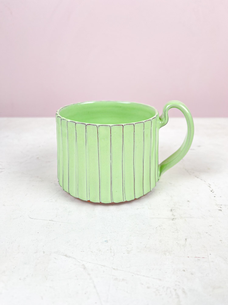 trine lace ceramics - ceramic cups with grooves in light green