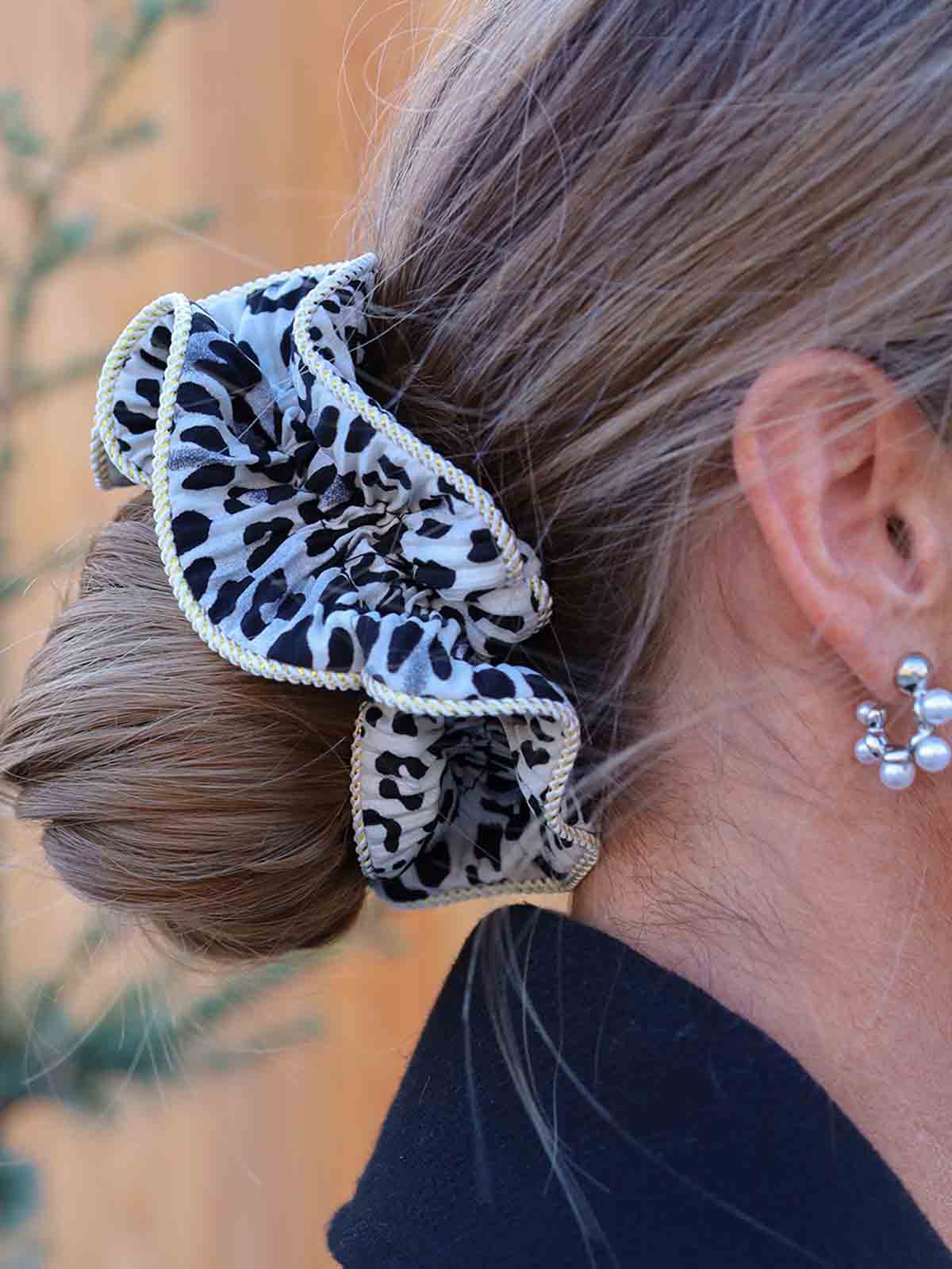 by starling scruncies lily in gray leopard