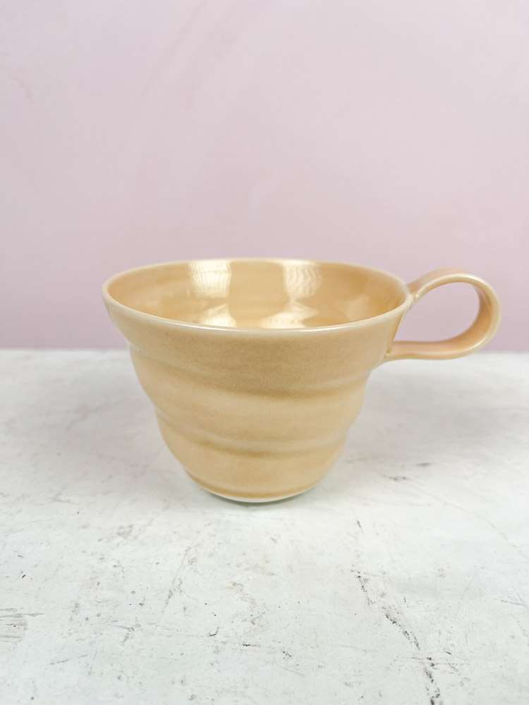 rikke mandelsen ceramic spiral cup with handle melon, coffee cup in porcelain, remix by Sofia.