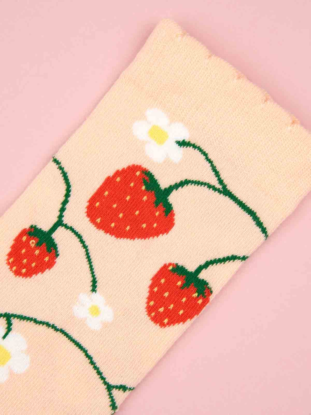 cou cou suzette socks with strawberry plants on coral bottom