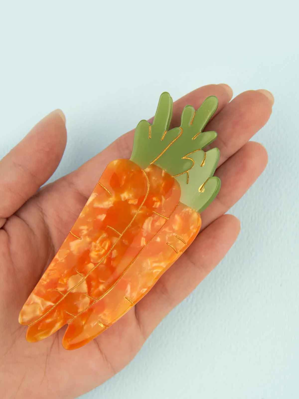cou cou suzette hair clip with carrots in orange and green