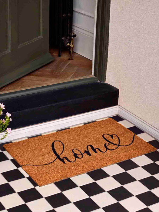 doormat in nature with home in coconut fibers