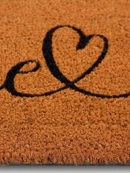 doormat in nature with home in coconut fibers