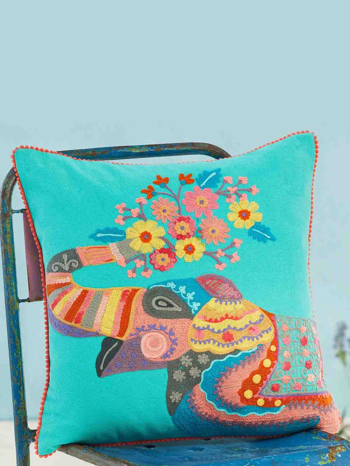 pillow with embroidered elephant