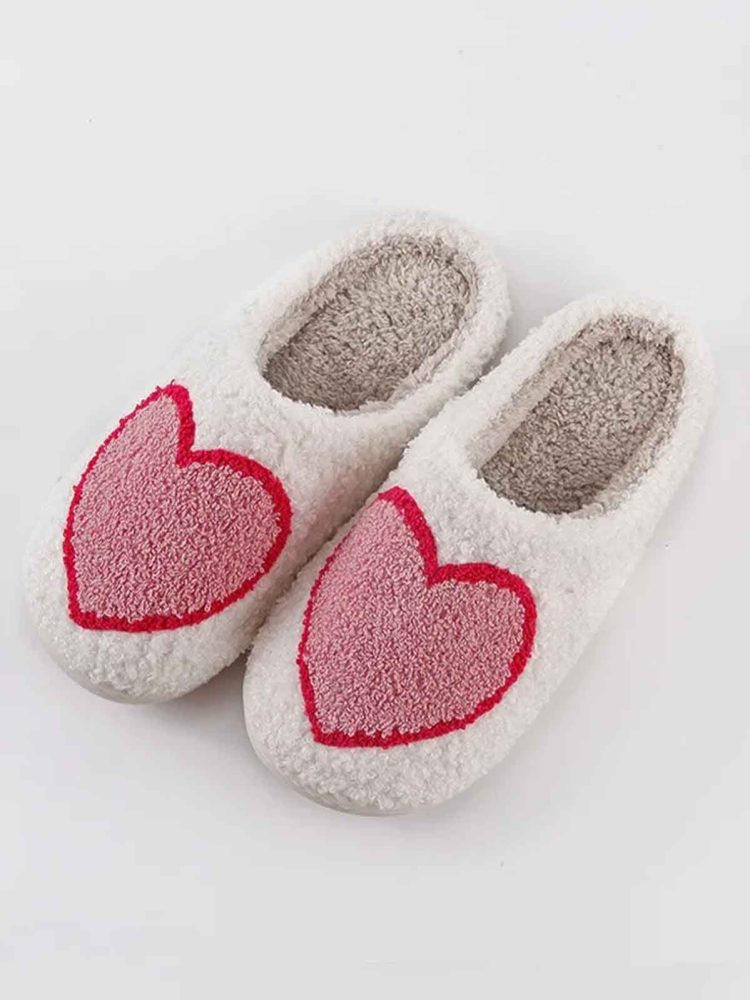 remix by Sofie shoes with a big pink heart