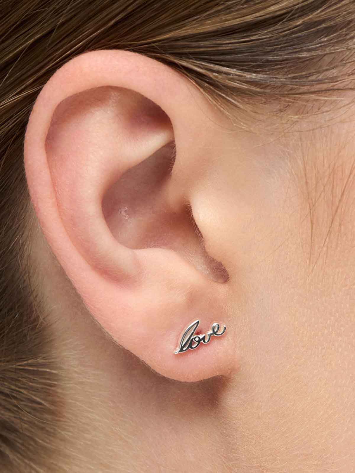 lulu copenhagen earrings in silver and gold with laws